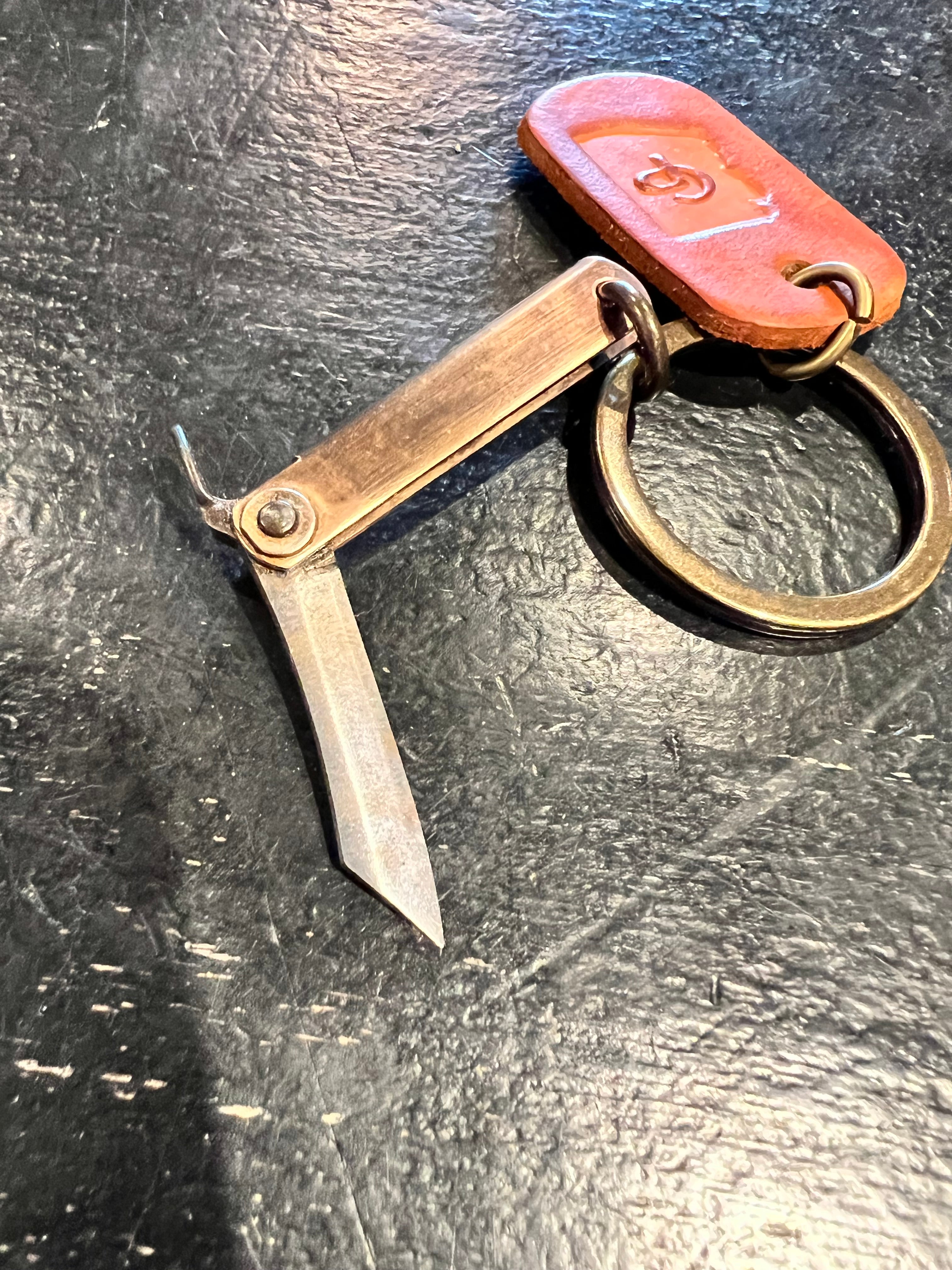 Cave + Post Keychain With Mini Higo