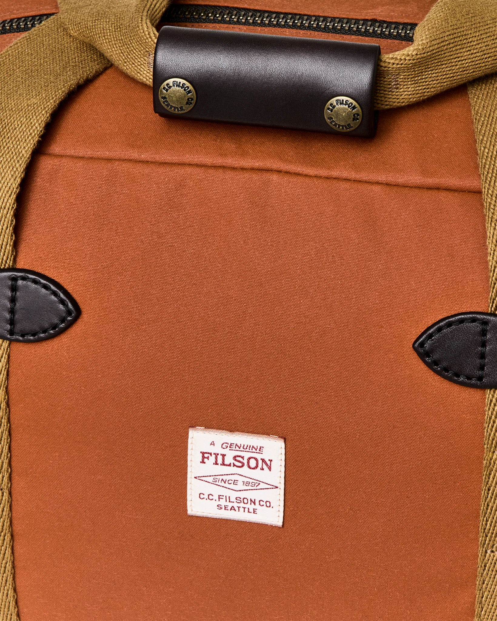 SMALL TIN CLOTH DUFFLE BAG - RUST