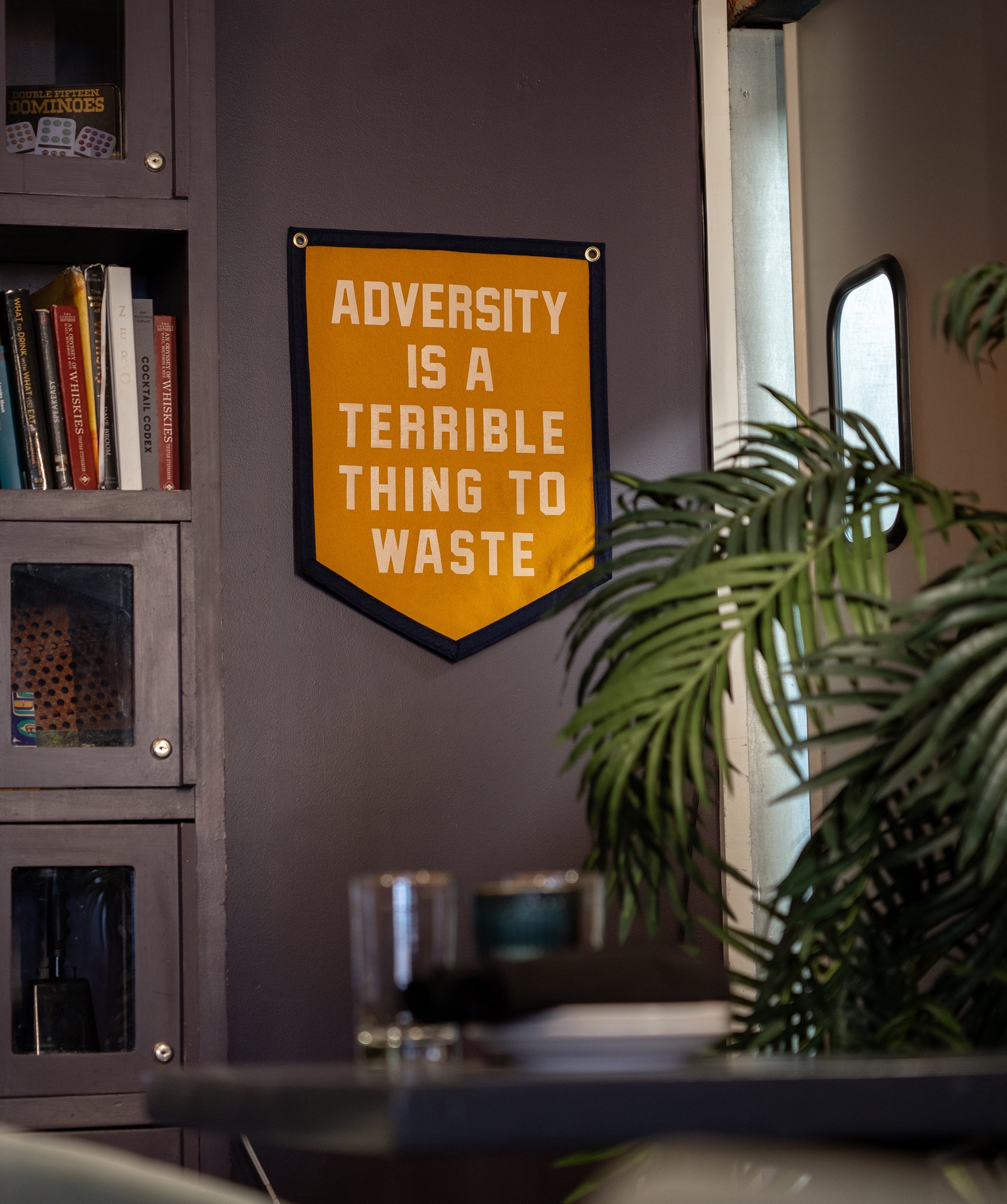 Adversity Is A Terrible Thing To Waste Camp Flag • Unreasonable Hospitality x Oxford Pennant