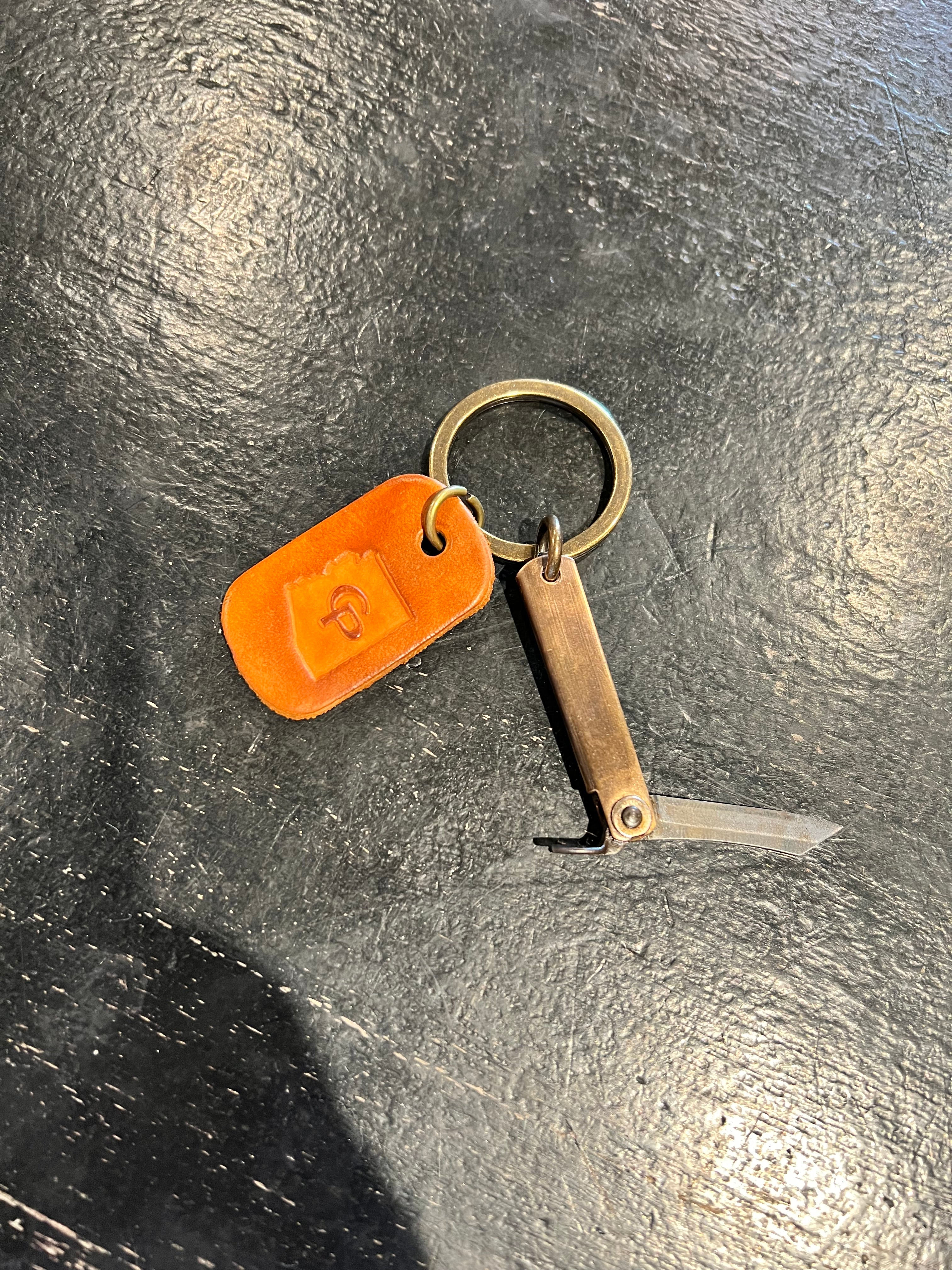Cave + Post Keychain With Mini Higo