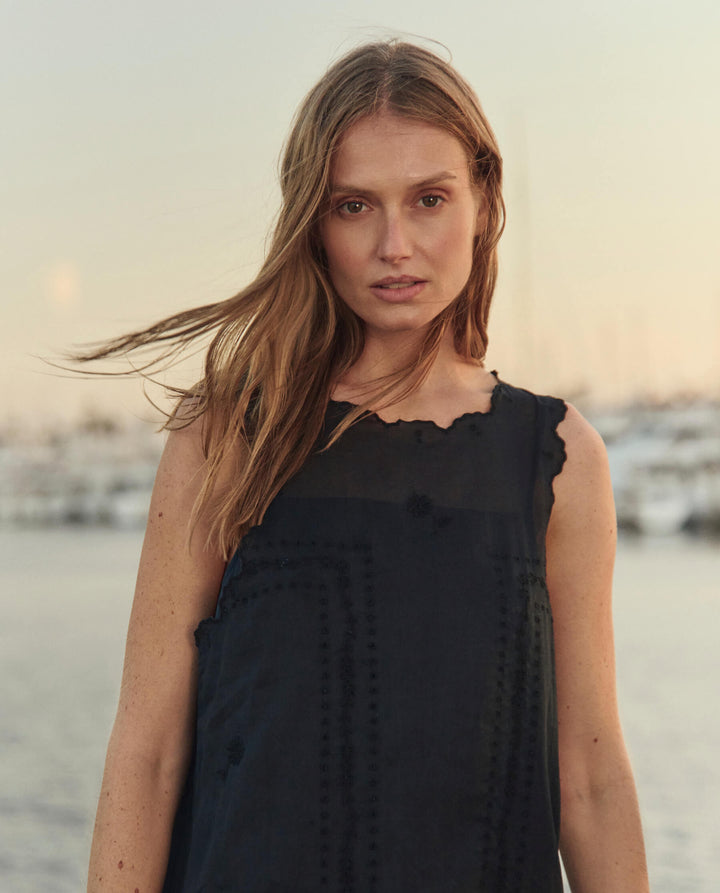 THE SCALLOPED EYELET SHIFT DRESS. Black.