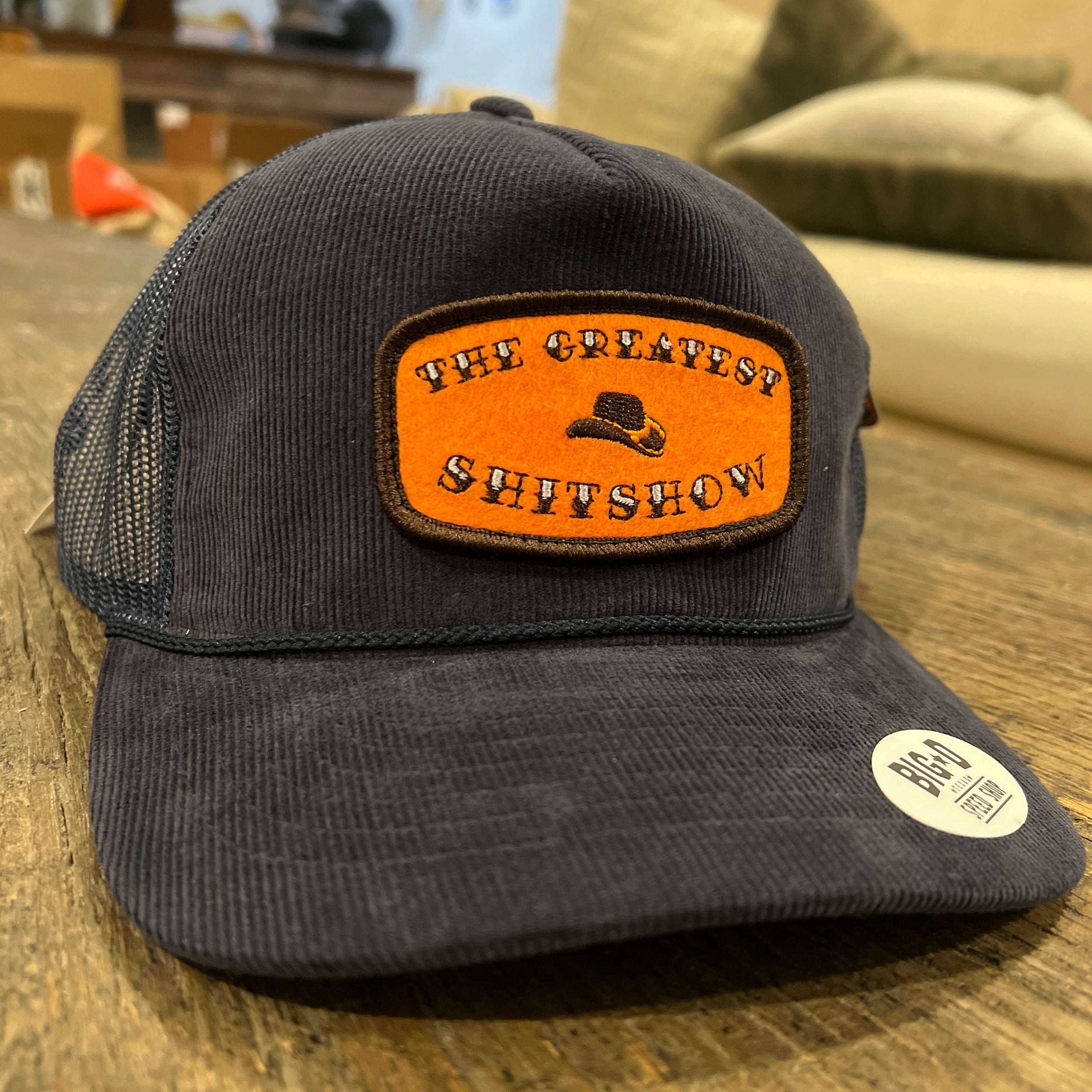 The Greatest $h!t$how - Orange Patch on Navy Corduroy Trucker