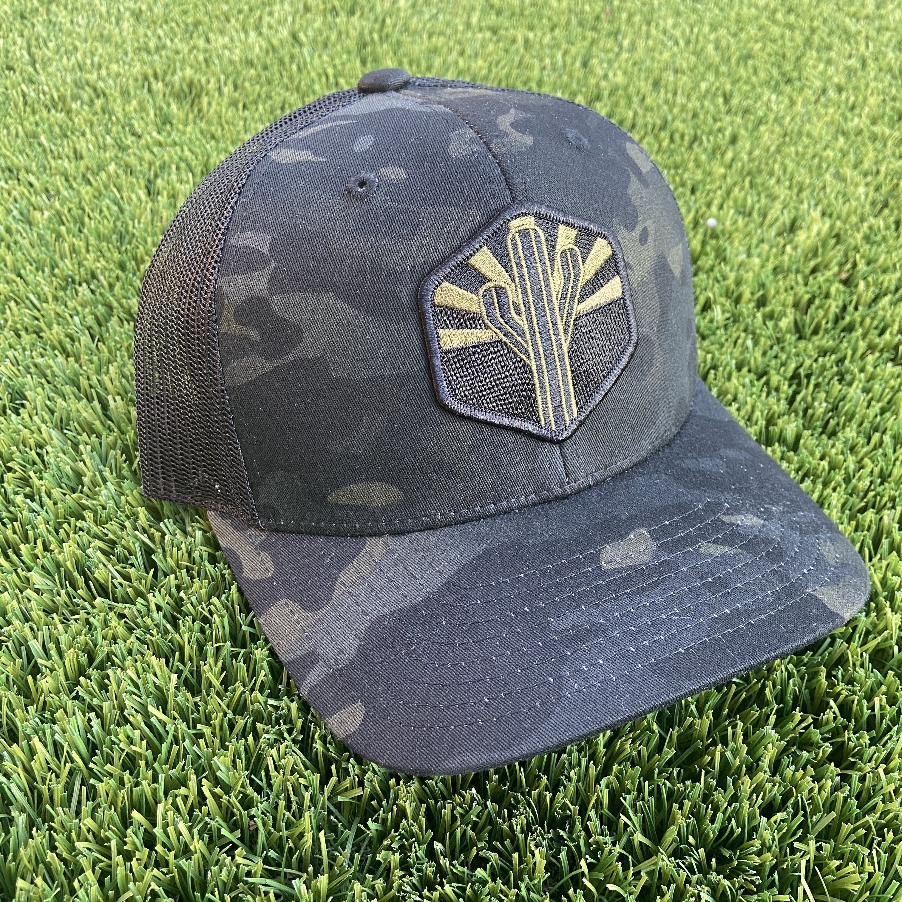 The Military Sentinel Curved Trucker - Camo on Black